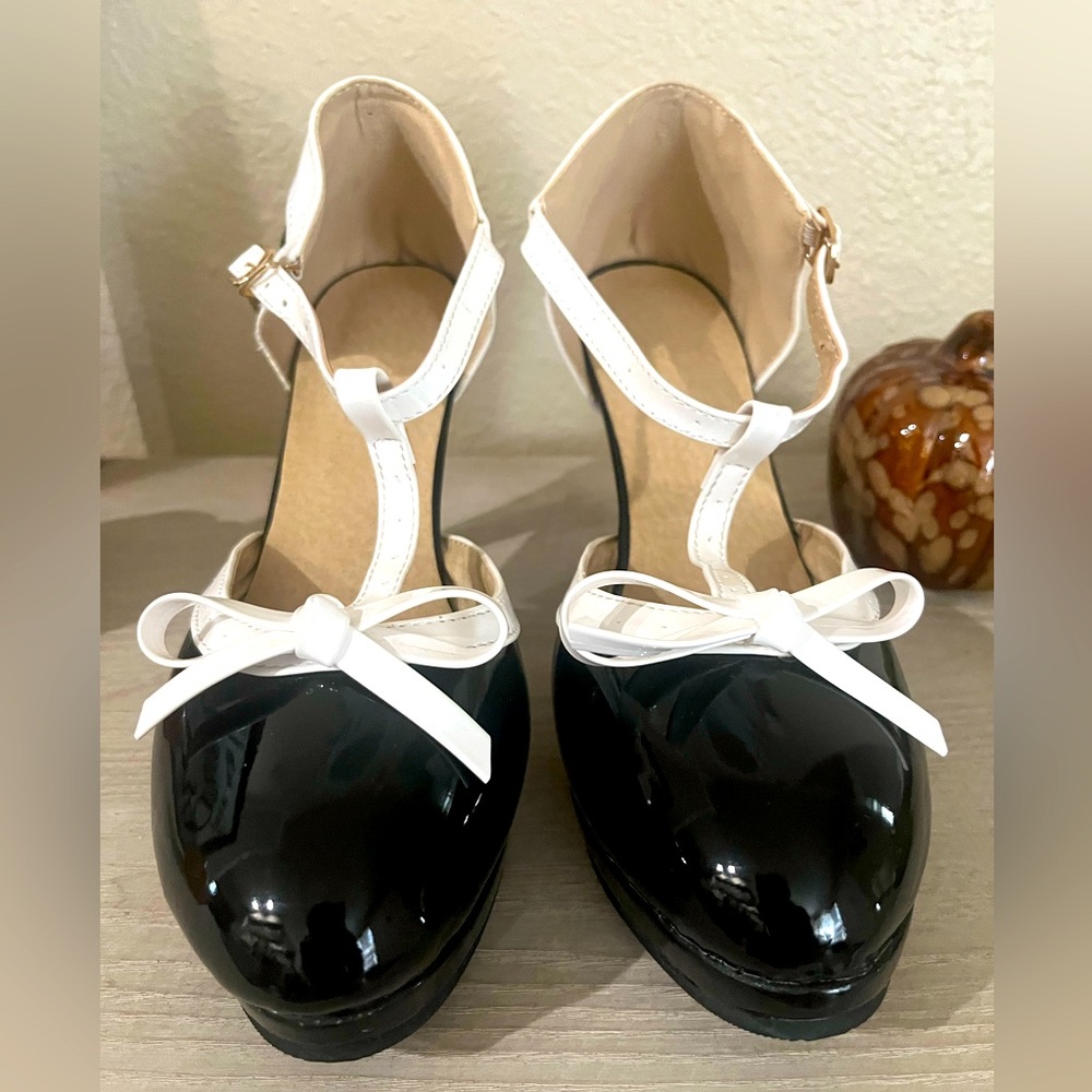 Size 41 black patent platform heels